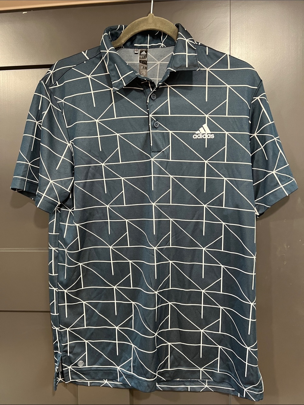 adidas Men’s Dark Blue Polo with White Geometric Pattern